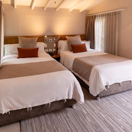 Termales El Otono Hotel La Enea Exterior foto A room at the hotel