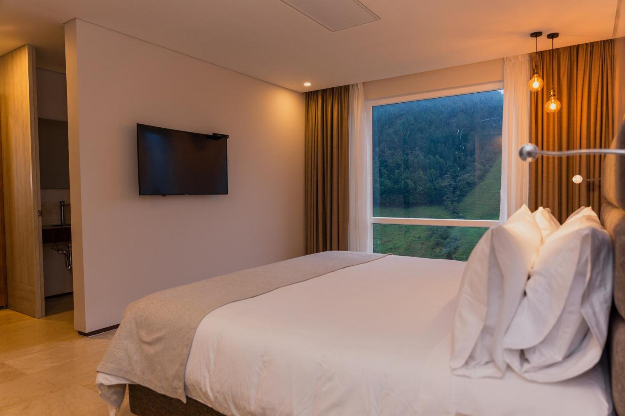 Termales El Otono Hotel La Enea Exterior foto A bedroom at the hotel